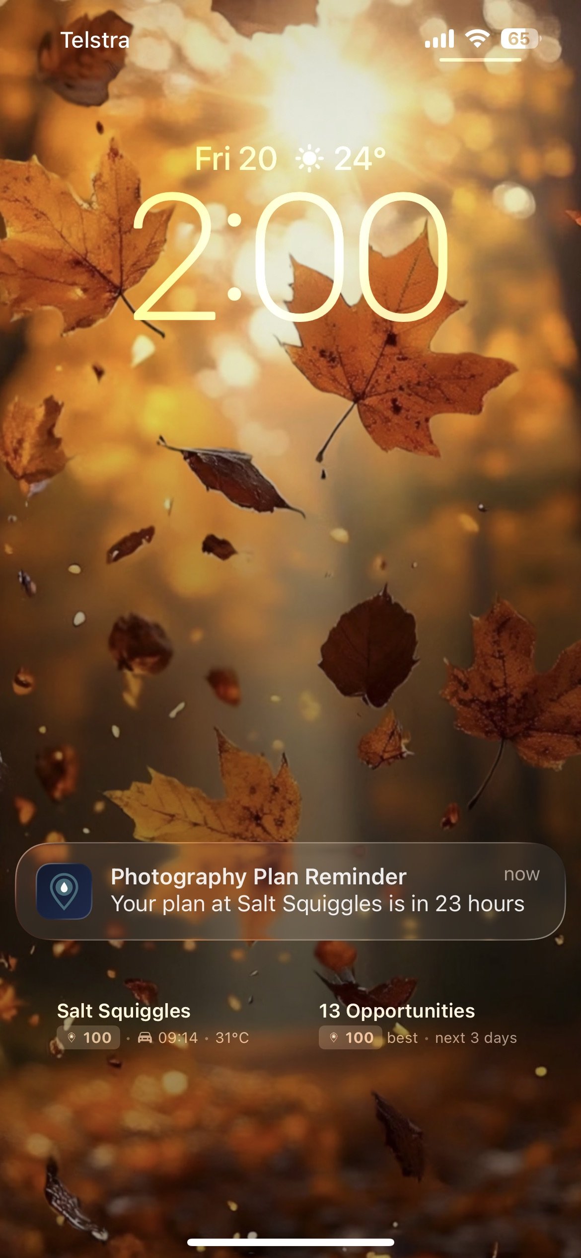 iPhone lock screen showing a ShutterTime plan reminder notification — Your plan at Salt Squiggles is in 23 hours — with lock screen widgets showing score and opportunities